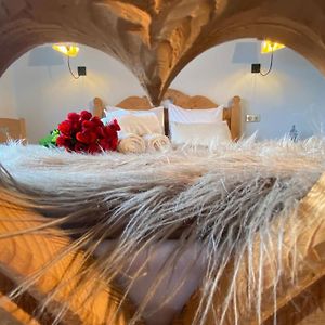 Kamer met een Queen Size Bed